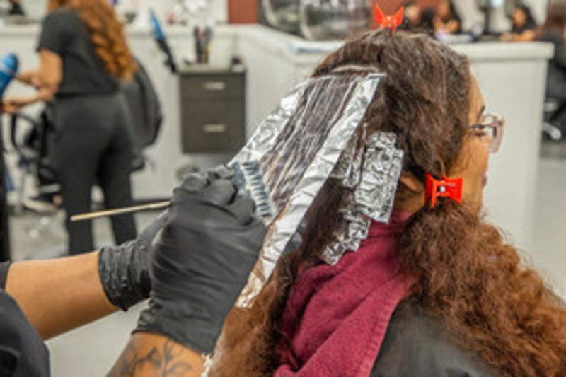 stylist coloring hair